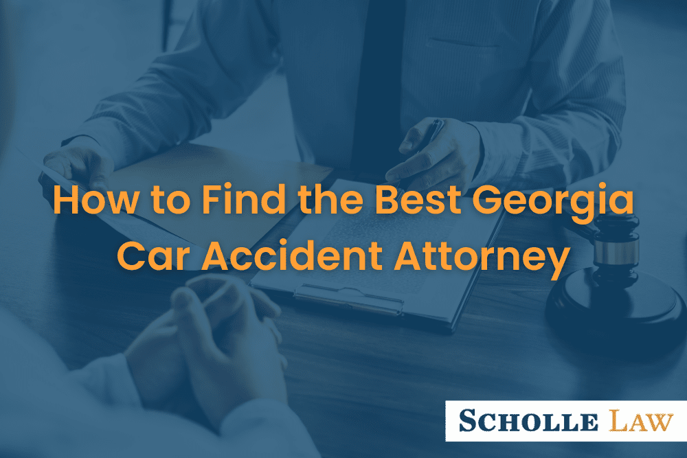 lawyer reviewing a case with a client, How to Find the Best Georgia Car Accident Attorney