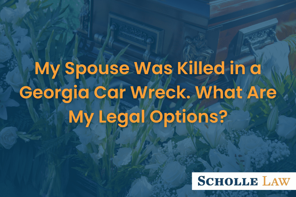 casket surrounded by white flowers, My Spouse Was Killed in a Georgia Car Wreck. What Are My Legal Options?