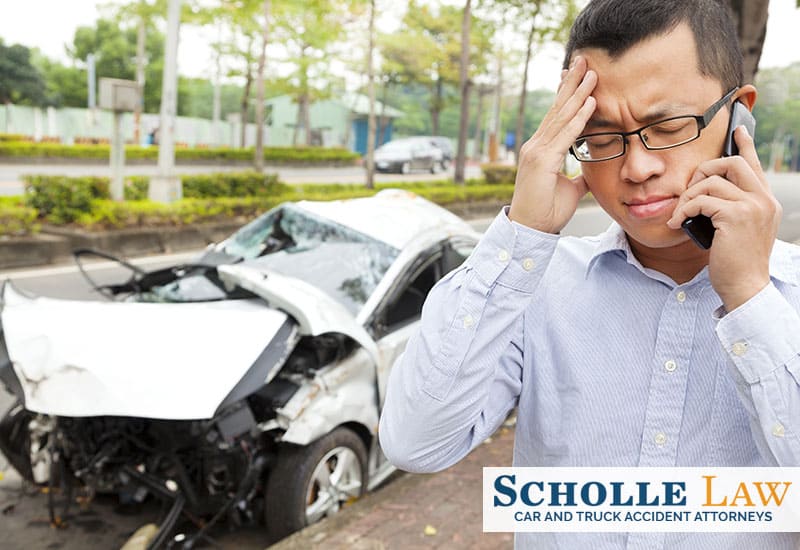 man with headache after car accident