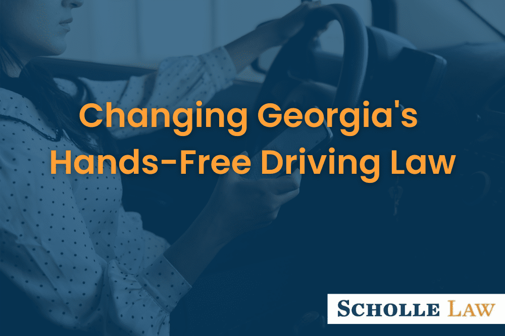 woman texting and driving, Changing Georgia's Hands Free Driving Law