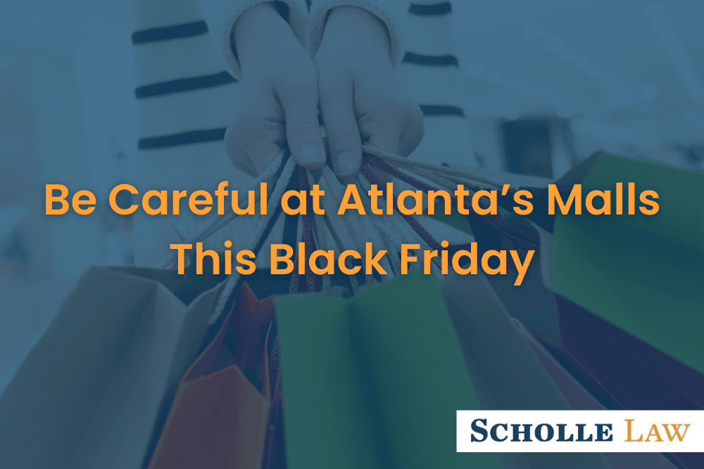closeup of woman's hands holding colorful shopping bags, Be Careful at Atlanta’s Malls This Black Friday