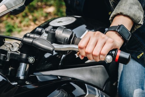 Close up of motorcycle rider hand holding clutch