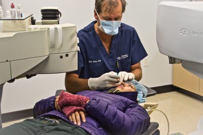 Woman undergoing LASIK eye surgery