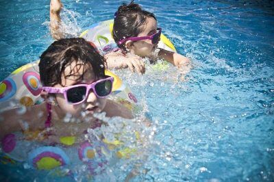 closeup of little girls in a swimming pool