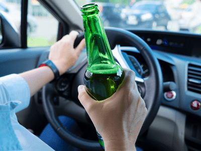 holding a beer while driving