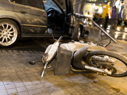 tipped over moped after a hit and run accident