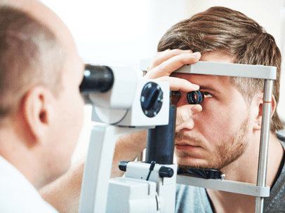 doctor performing eye exam