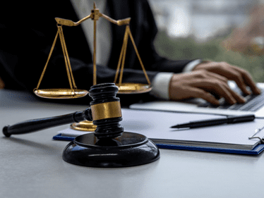 lawyer typing on his computer