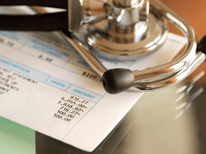 stethoscope on a hospital bill