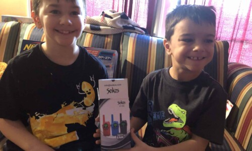 In the Community 17 Christmas Wish recipients with walkie talkies