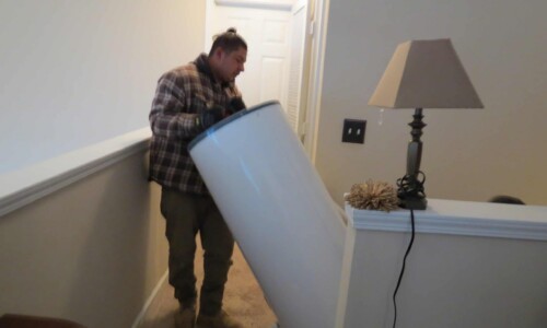 In the Community 24 Out with the broken water heater, in with the new