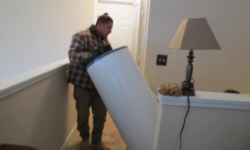 In the Community 20 Out with the broken water heater, in with the new